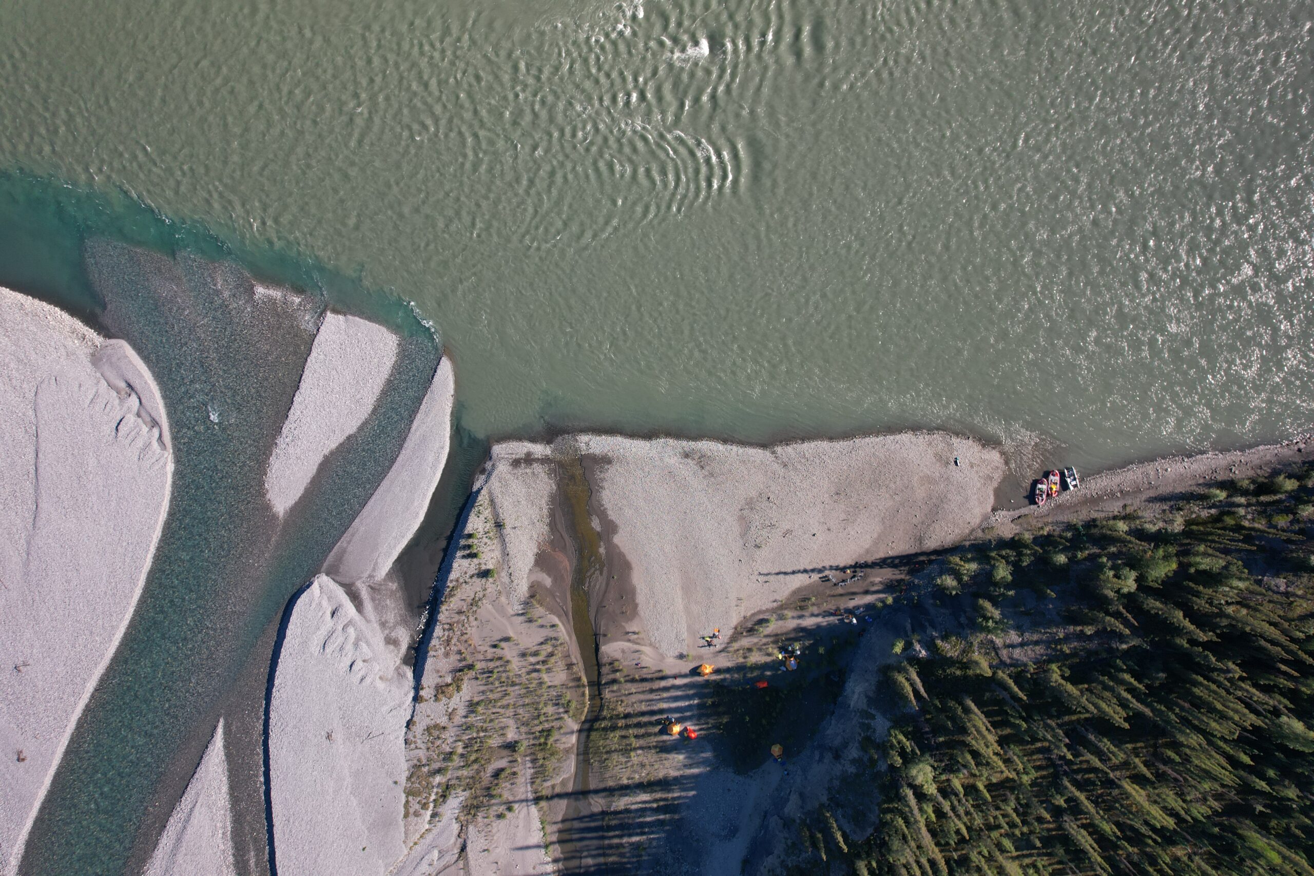 A drone shot of a campsite on the Nahanni River