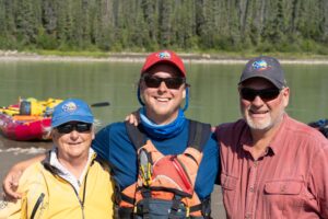 Owners Al Lin and Taylor on the banks of the Keele River in 2021